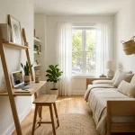 A well-organized small guest room and office featuring a sleek desk and a comfortable daybed.